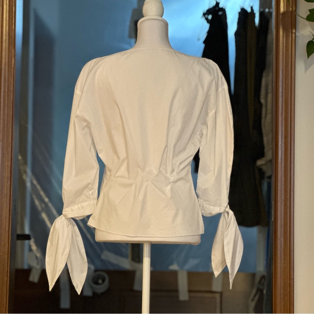 White cotton Zara blouse with side zip and cute ties at the wrist